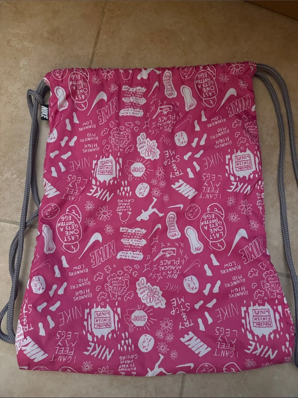 Nike Pink Logo-Print Drawstring Bag with Gray Cords